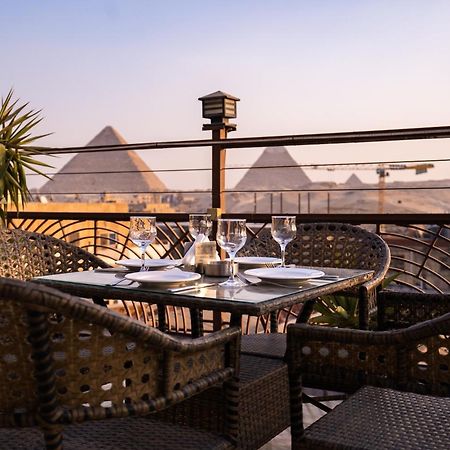 Pyramids Gem Plaza Hotel Kafret el-Gabal Buitenkant foto