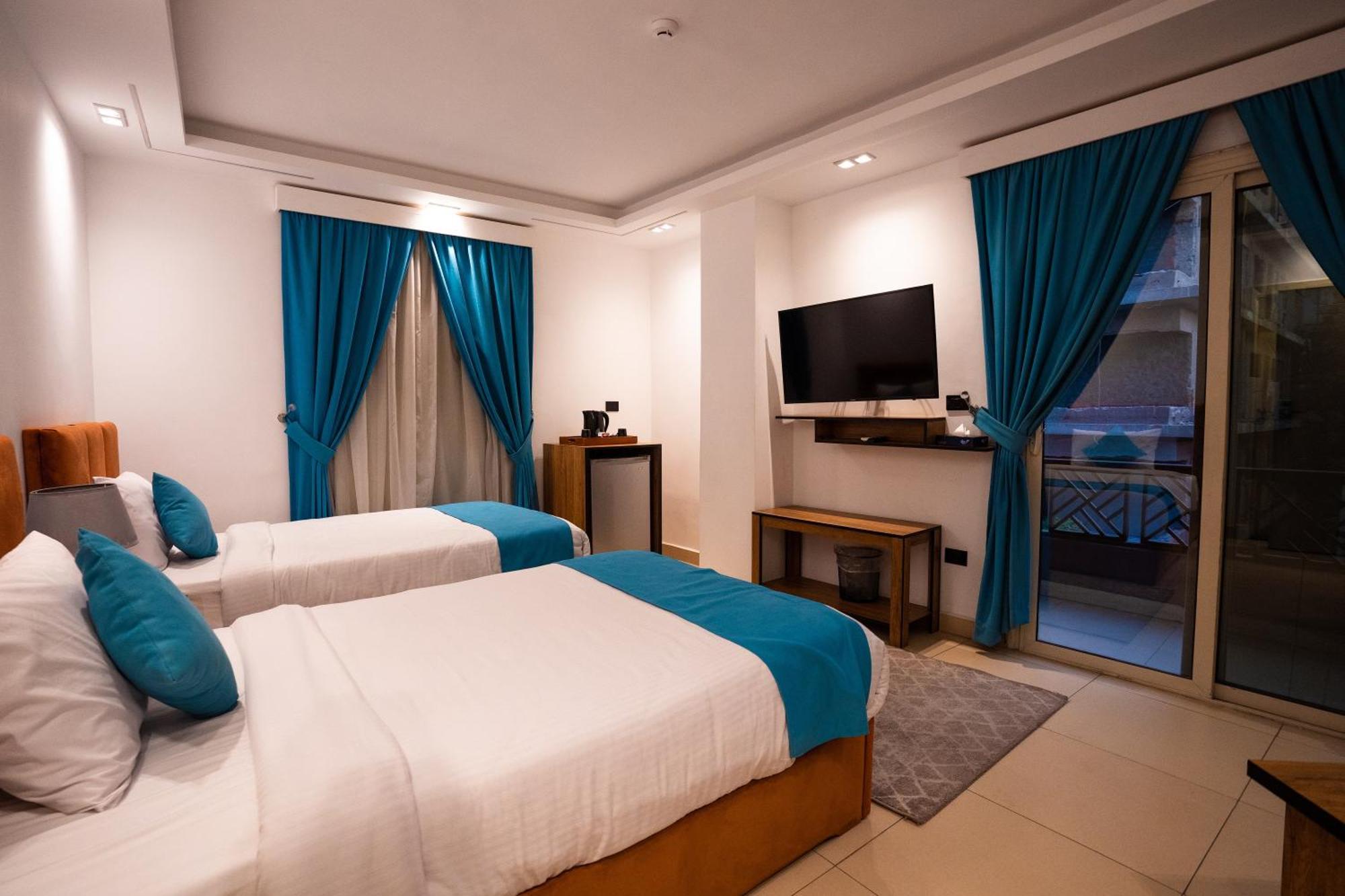 Pyramids Gem Plaza Hotel Kafret el-Gabal Buitenkant foto