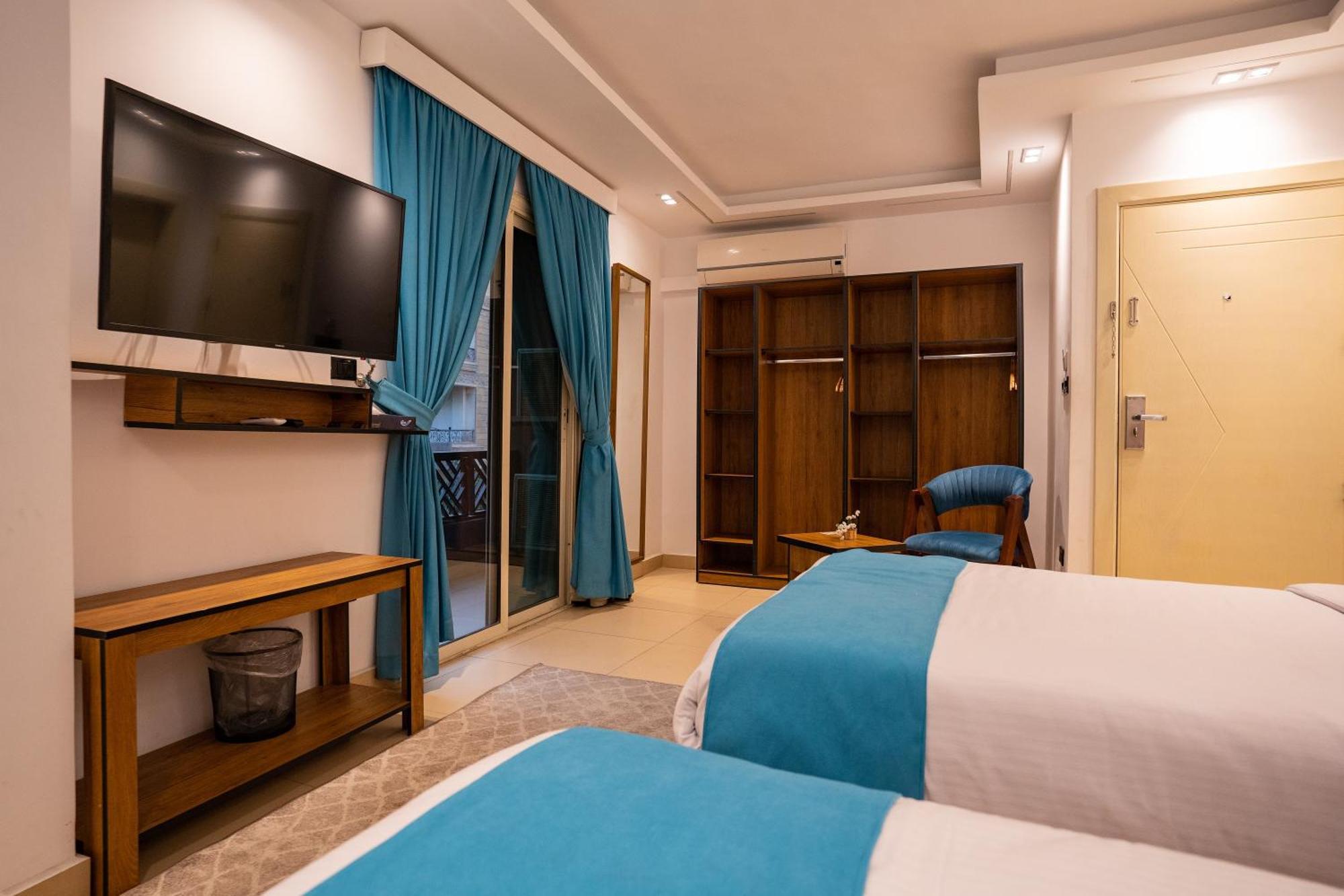 Pyramids Gem Plaza Hotel Kafret el-Gabal Buitenkant foto