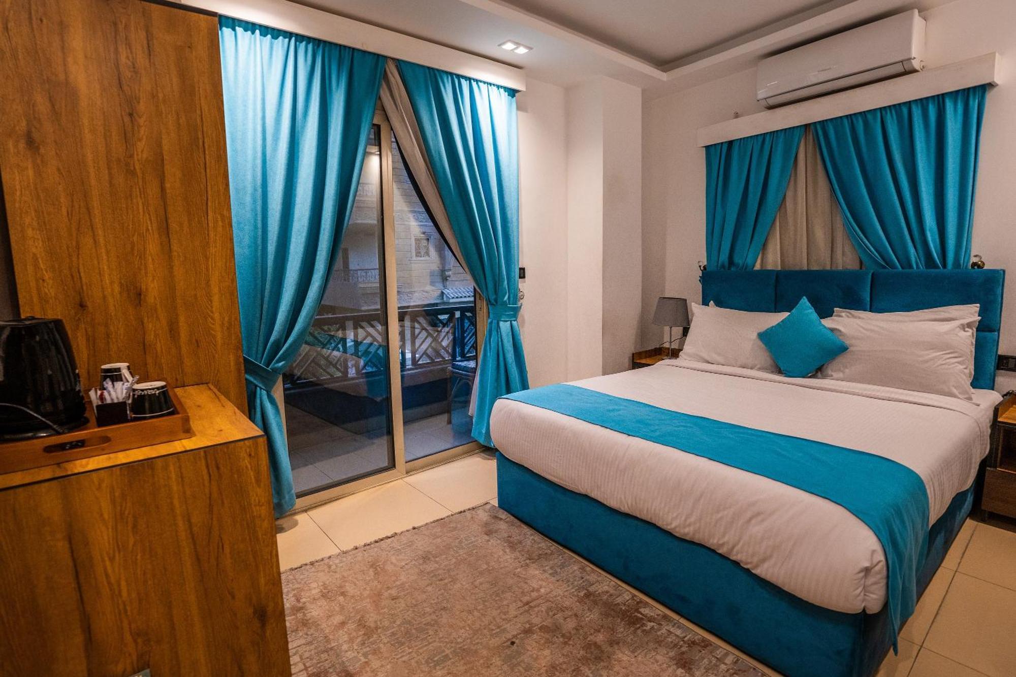 Pyramids Gem Plaza Hotel Kafret el-Gabal Buitenkant foto